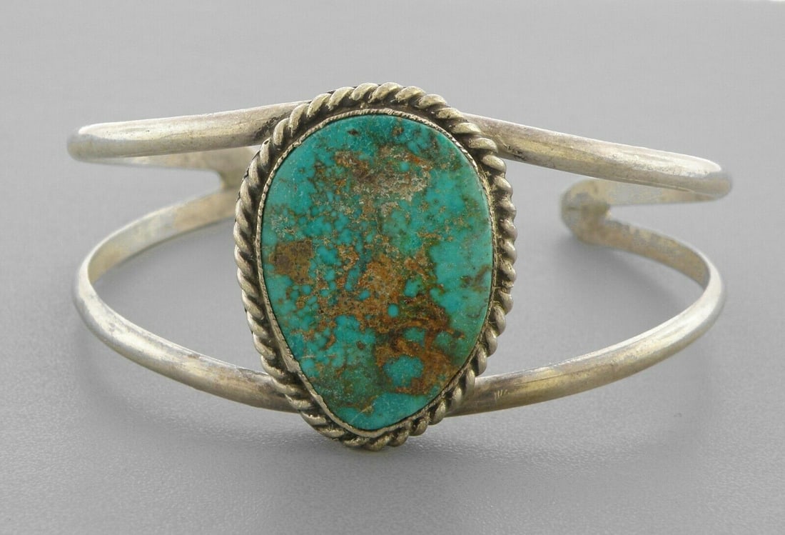 VINTAGE NAVAJO STERLING SILVER ROYSTON TURQUOISE CUFF: VINTAGE TURQUOISE STERLING SILVER CUFF Vintage Navajo Royston Turquoise sterling silver cuff bangle Measures 2.42" inside measurement Measures 1.24" Wide in front Vintage, Pre-owned, in good condition