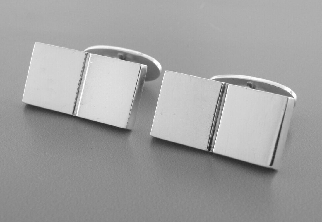 VINTAGE GEORG JENSEN STERLING SILVER OPEN BOOK CUFFLINKS 109: GEORG JENSEN STERLING SILVER CUFFLINKS Georg Jensen sterling silver open book Cufflinks Designed by Nanna Ditzel Face measures 0.95" W x 0.49" H Vintage, Pre-owned in good condition, minor minor wear,