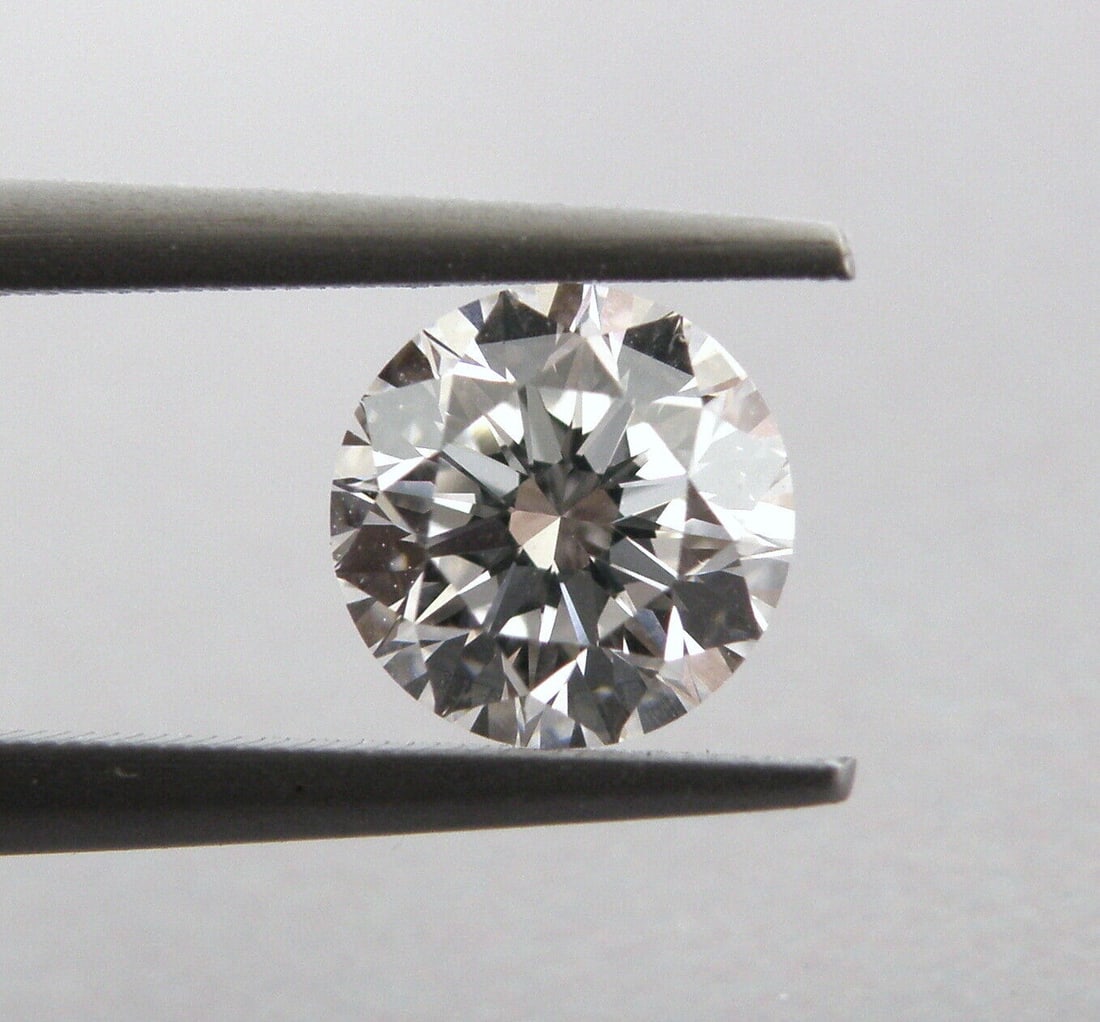 IGI CERTIFIED 1ct LOOSE LAB-CREATED DIAMOND CVD - ROUND CUT H VVS1 TRIPLE EX: 1.00ct LAB GROWN ROUND DIAMOND IGI certified 1ct round cut lab created diamond CVD 1ct H VVS1 Polish Excellent Symmetry Excellent Cut Excellent Measures 6.33mm x 6.36mm x 4.03mm New diamond never used