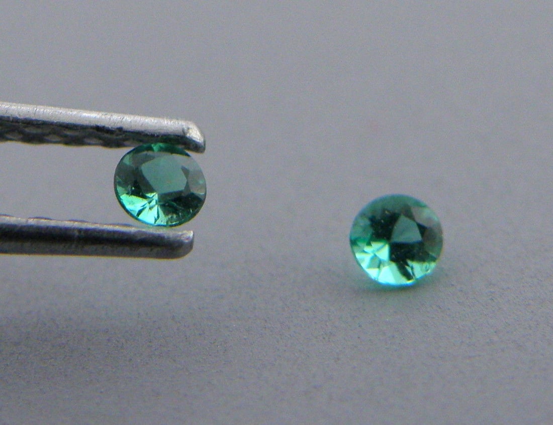 3.2mm MATCHING PAIR ROUND COLOMBIAN EMERALD GREEN: Sale is for 2 round cut natural Emeralds Matching pair Emeralds measures 3.2mm in diameter New, never used before