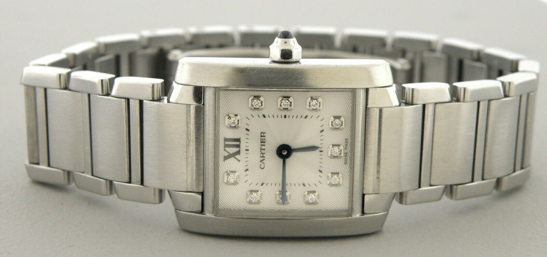 CARTIER TANK FRANCAISE DIAMOND DIAL STAINLESS WATCH: CARTIER TANK FRANCAISE DIAMOND STAINLESS STEEL WATCH Watch will fit a wrist size of 6" Face measures 20mm wide without crown Cartier Tank Francaise stainless steel watch with a diamond dial, matte and