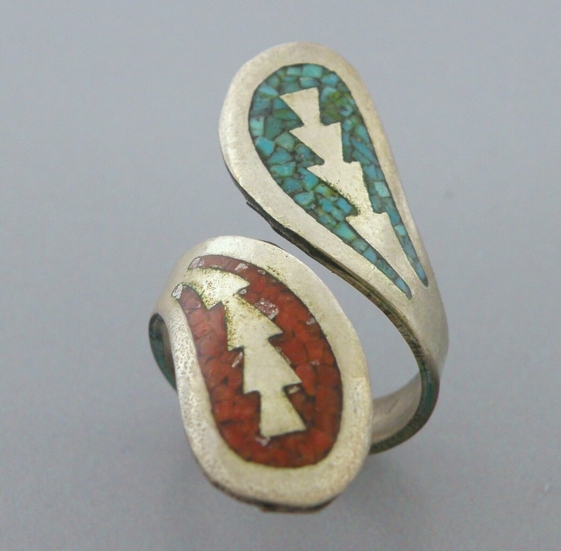VINTAGE NAVAJO STERLING SILVER CORAL & TURQUOISE INLAY CROSSOVER RING SIZE 7.5: VINTAGE TURQUOISE STERLING SILVER RING Vintage Navajo Turquoise & coral inlay sterling silver crossover ring Size 7.5 (slightly adjustable) Ring Measures 1.50" Wide on top Vintage, Pre-owned, in good