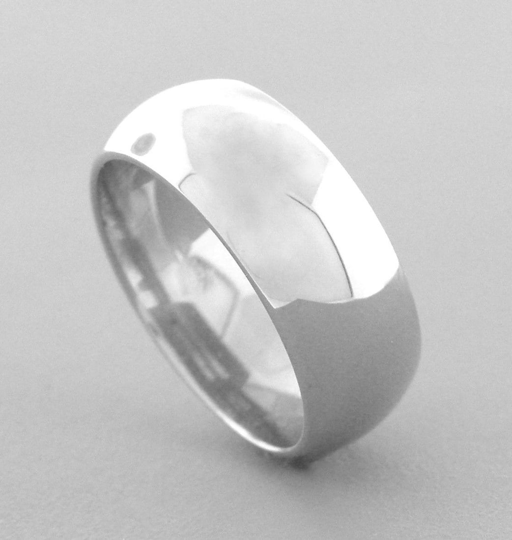 14K WHITE SOLID GOLD 7MM COMFORT BAND WEDDING RING 10: NEW 14K WHITE GOLD WEDDING COMFORT BAND RING 10If you want different size, please let us knowBand measures 7mm wide14K White gold Comfort fit Wedding band, smooth and rounded inside the band to make i