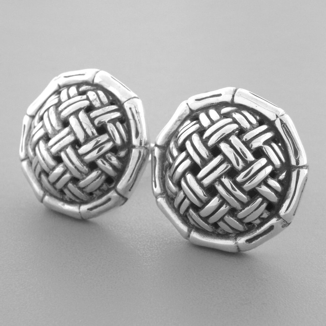 JOHN HARDY STERLING SILVER LARGE BASKET WEAVE EARRINGS: JOHN HARDY STERLING SILVER EARRINGS Earrings measure 1" in diameter Sterling silver large door knocker, basket weave earrings Pre-owned in good condition,minor wear, please refer to pics Clip on Backs