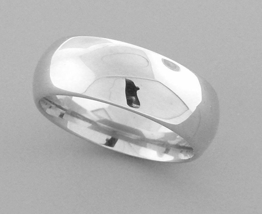 14K WHITE SOLID GOLD 6MM COMFORT BAND WEDDING RING 11: Size 11 Band measures 6mm wide 14K white gold Comfort fit Wedding band, smooth and rounded inside the band to make it more comfortable on the finger for everyday wear. Solid gold and thick, not light