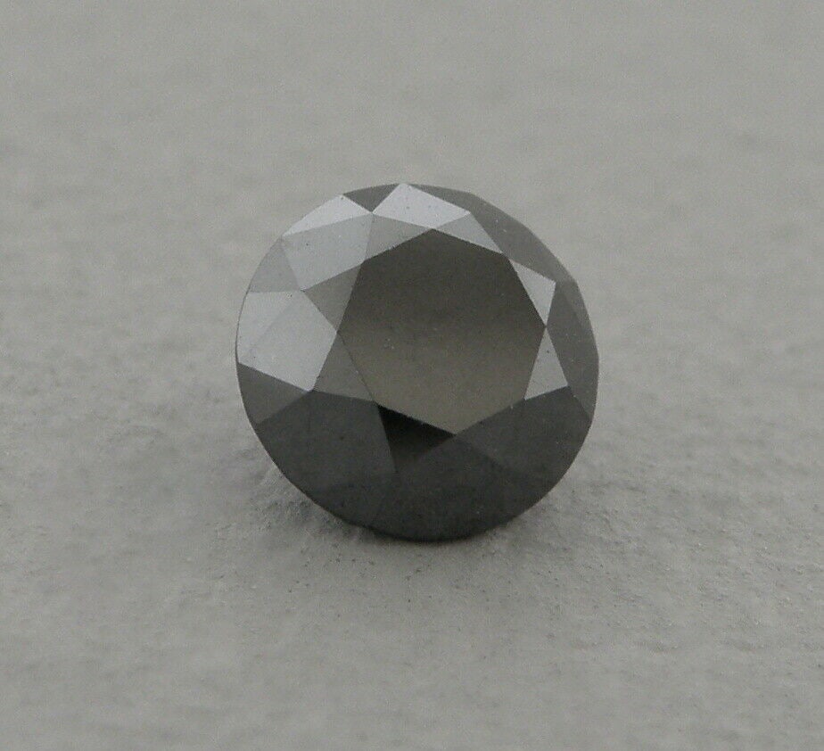 ROUND CUT LOOSE NATURAL BLACK DIAMOND 5mm: LOOSE NATURAL BLACK DIAMOND Size measures 5mm in diameter Diamond is Black, opaque, Beautiful polish Diamond is a heated black diamond Great for repairing or creating jewelry New