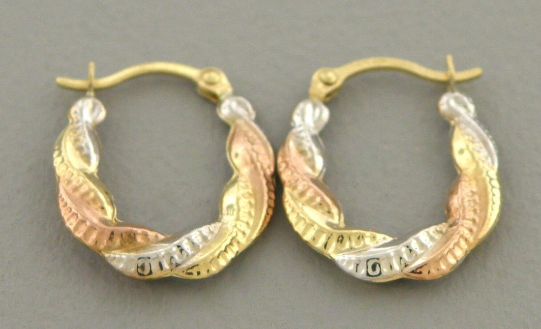 NEW 14K TRI COLOR GOLD FANCY HOLLOW SHRIMP EARRINGS: NEW 14K TRI COLOR GOLD EARRINGS New 14K Tri-color Gold Earrings Measures: 13mm in diameter Hollow Shrimp Earrings with clasp backing Earrings have a polished finish Super Light Stamp: 14k Avg Weight: