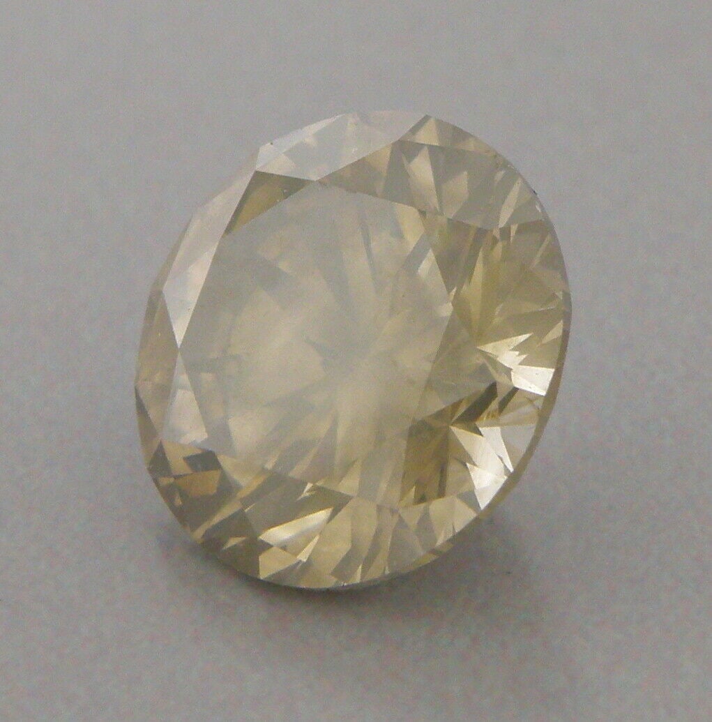 GIA CERTIFIED 4.84ct NATURAL LOOSE FANCY DARK BROWN - YELLOW ROUND CUT DIAMOND: 4.84ct NATURAL LOOSE DIAMOND GIA certified Natural Fancy dark brown-greenish yellow even round brilliant cut diamond 4.84ct Measures 10.81mm x 10.88 x 6.68mm New diamond never used Natural color, untr