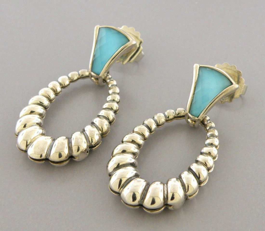 NEW LAGOS STERLING SILVER VENUS OVAL TURQUOISE EARRINGS: LAGOS STERLING SILVER EARRINGS Earrings measure 1.64" H x 0.80" W Lagos sterling silver venus link oval fluted earrings turquoise New with original back Butterfly Backs Stamped LAGOS 925 posts are 14K