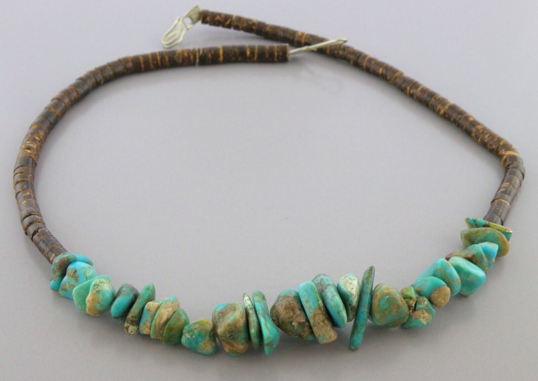 VINTAGE NAVAJO STERLING SILVER HEISHI NUGGET ROYSTON TURQUOISE NECKLACE: VINTAGE TURQUOISE STERLING SILVER NECKLACE Vintage sterling silver Nugget Royston Turquoise necklace with Heishi beads Measures 17.5" Long Measures apx 0.74" at it's widest Vintage, Pre-owned, in good