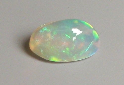 1.57ct AFRICAN CLEAR OPAL OVAL CABOCHON CUT NATURAL (1 of 2)