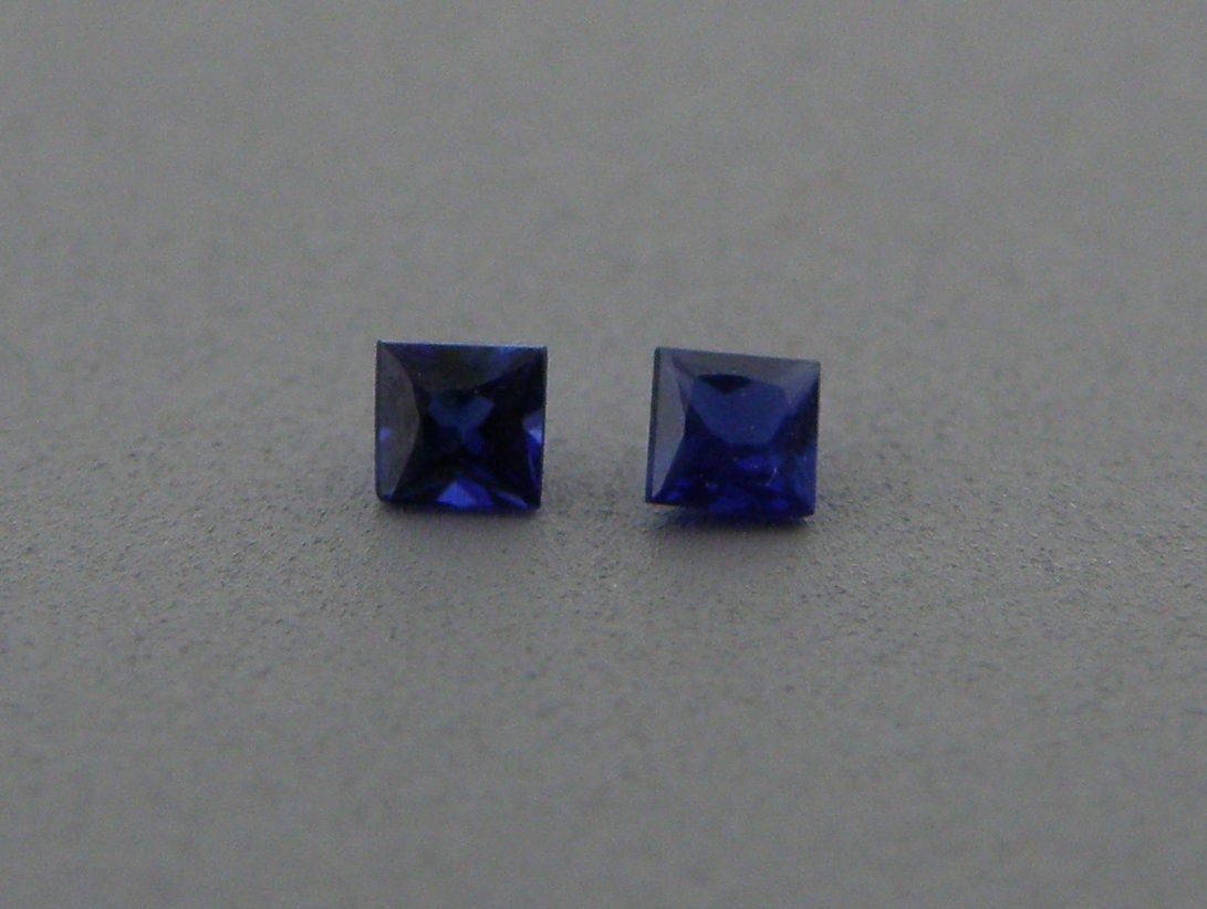 2.8mm PRINCESS CUT MATCHING PAIR NATURAL BLUE SAPPHIRE: Sale is for 2 princess cut natural blue sapphiresMatching pairSapphires measures 2.8mm x 2.8mmNew, never used before