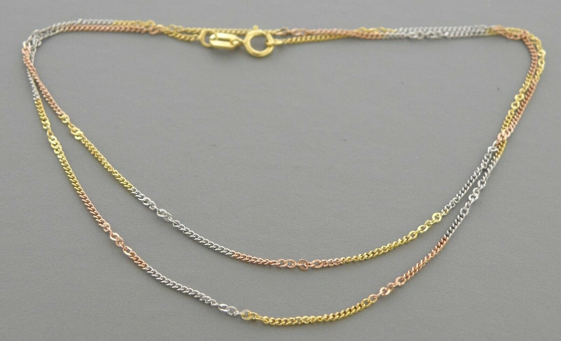 NEW 14K TRI COLOR GOLD MIRROR CURB CHAIN CHAIN NECKLACE: 4K TRI COLOR GOLD MIRROR CURB NECKLACE 14K Solid Tri color Gold (not gold plated or gold filled) 1mm wide Length 18" Well made chain Has a spring clasp 14K Tri color Gold, polished finish Chain is New