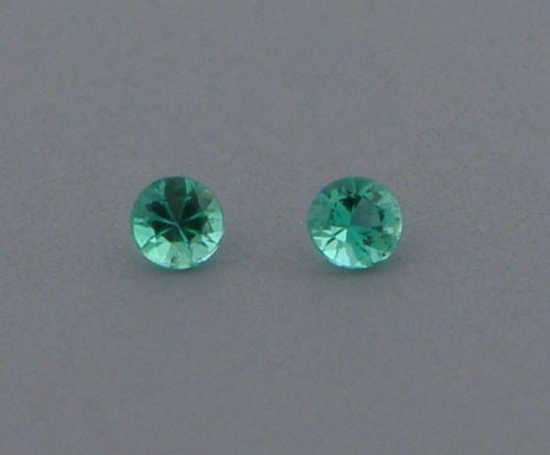 2.8mm MATCHING PAIR ROUND COLOMBIAN EMERALD GREEN (1 of 1)