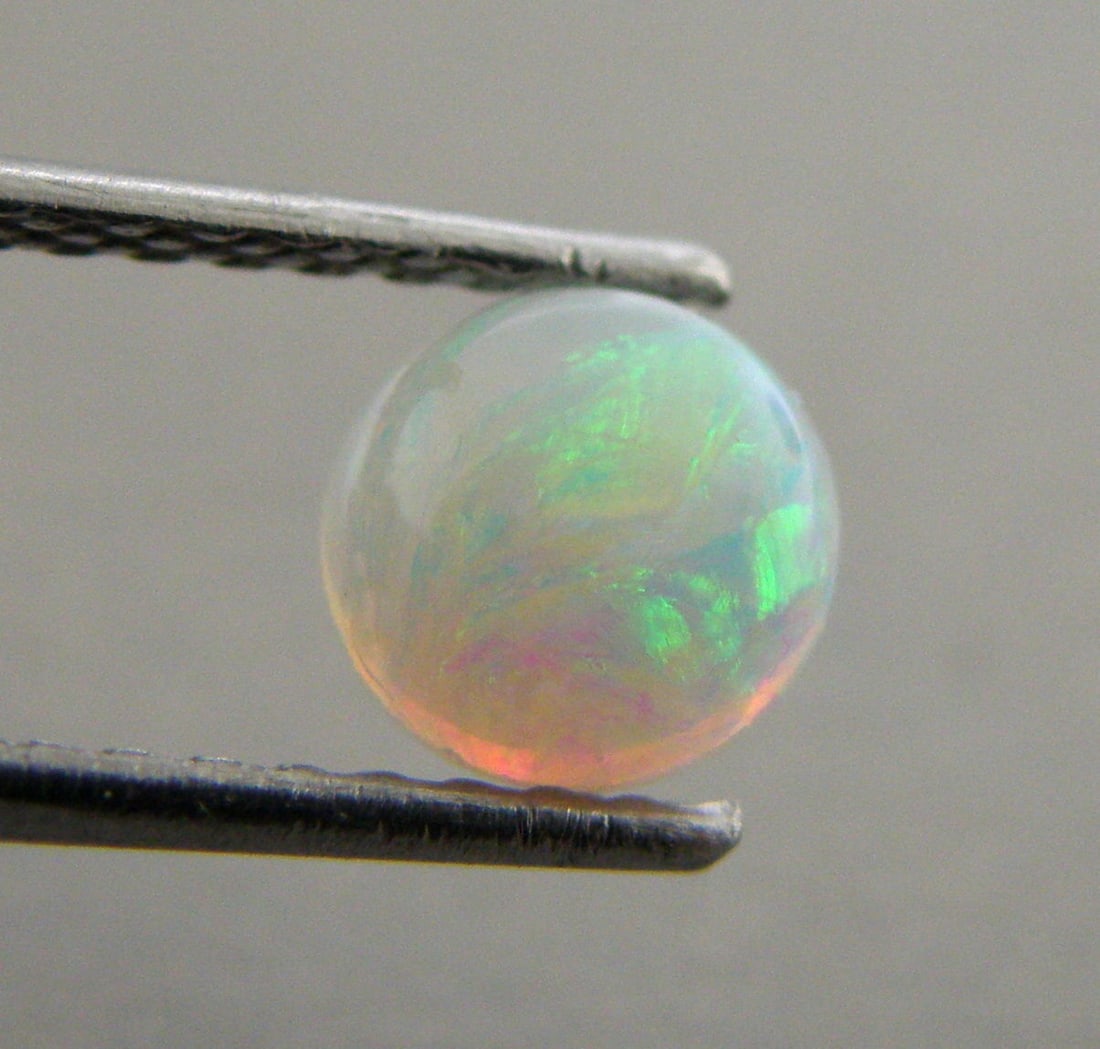 5mm NATURAL UNTREATED WHITE MULTI COLORED OPAL ROUND (1 of 1)