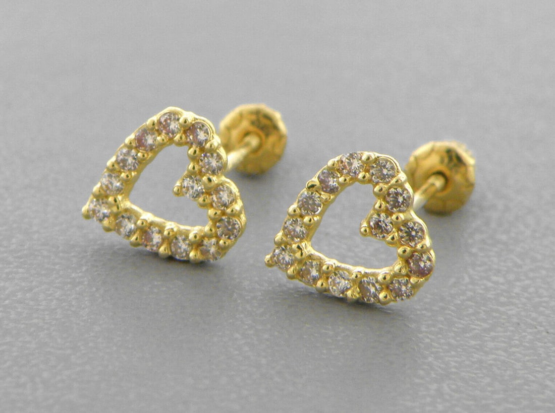 14K YELLOW GOLD CHILDRENS GIRLS STUD CZ EARRINGS HEART: NEW 14K YELLOW GOLD STUD EARRINGS New 14K Yellow Gold Earrings Measures: 6mm W x 6.5mm H Earrings with Cubic Zirconia Earrings have a polished finish Screw back Stamp: 14k Avg Weight: apx 1g