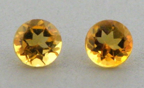 10mm MATCHING PAIR ROUND CUT NATURAL LOOSE CITRINE: LOOSE NATURAL CITRINE ROUND CUTSale is for 2 round cut natural citrinesMatching pairCitrines measures 10mm in diameterNew, never used before, perfect for jewelry repair