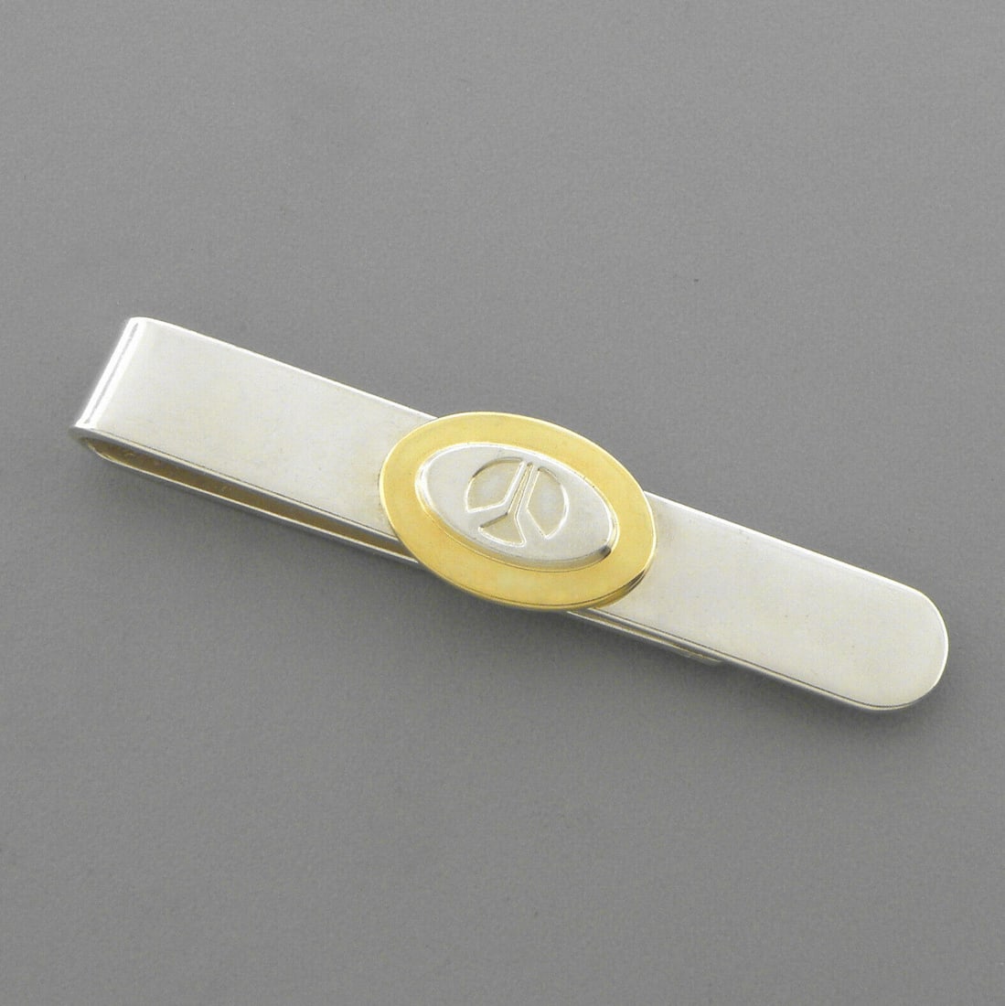 TIFFANY & CO. 18K GOLD SILVER NASA ROCKWELL TIE CLIP: TIFFANY & Co. 18K STERLING SILVER TIE CLIP Tie clip measure 2.07\" H x 0.44\" W Tiffany & Co. 18K gold sterling silver NASA Rockwell tie clip Vintage, Pre-owned in good working condition, minor wear,