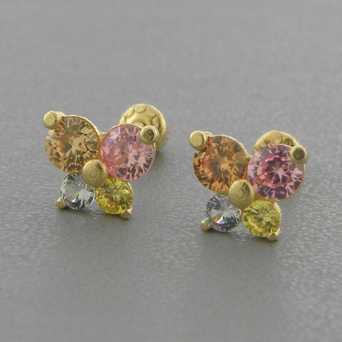 14K GOLD STUD CZ EARRINGS SCREW BACK COLORED BUTTERFLY: NEW 14K YELLOW GOLD STUD EARRINGS New 14K Yellow Gold Earrings Measures: 5mm x 6.5mm Stud Earrings with Cubic Zirconia Earrings have a polished finish Screw back Stamp: 14k Avg Weight: apx 1g