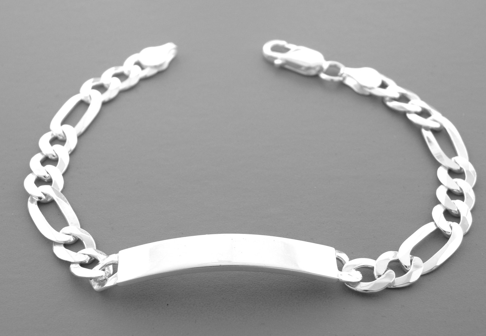 NEW STERLING SILVER ID BRACELET10mm WIDE MENS FIGARO: NEW STERLING SILVER ID BRACELET New sterling silver ID bracelet 10mm wide Length is 8" Figaro ID bracelet Well made solid Italian bracelet Lobster clasp Sterling silver 925, polished finish Bracelet i