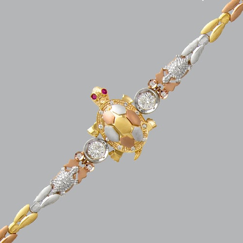 14K TRI- COLOR GOLD LADIES FANCY TURTLE CZ SET BRACELET: 14K TRI-COLOR GOLD BRACELET New 14K Tri-Color Gold Measures 5mm wide, 20mm at the widest point 7" Long Fancy set bracelet, CZ, High polish finish H Clasp Stamp: 14k Avg Weight: 7" = 14.7g