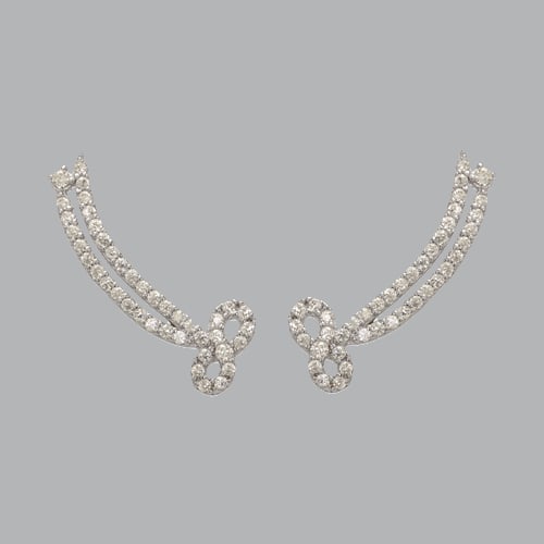 14K WHITE GOLD LADIES FANCY CRAWLER BOW CZ EARRINGS: 14K WHITE GOLD EARRINGS New 14K White Gold Earrings Measures: 8mm Wide x 22mm Long Crawler Earrings Set with CZ Earrings has a polish finish Stamp: 14k Avg Weight: 1.7g