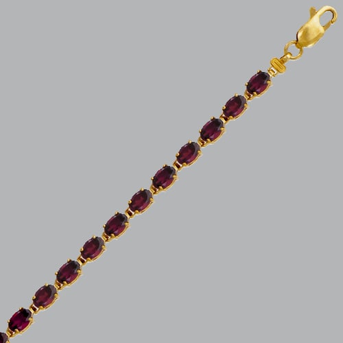 14K YELLOW GOLD OVAL CUT PURPLE CZ TENNIS BRACELET: NEW 14K YELLOW GOLD BRACELET New 14K Yellow Gold Bracelet Measures: 7" Long Purple oval CZ tennis bracelet Bracelet has a polished finish Lobster clasp Stamp: 14k Avg Weight: 8.3g