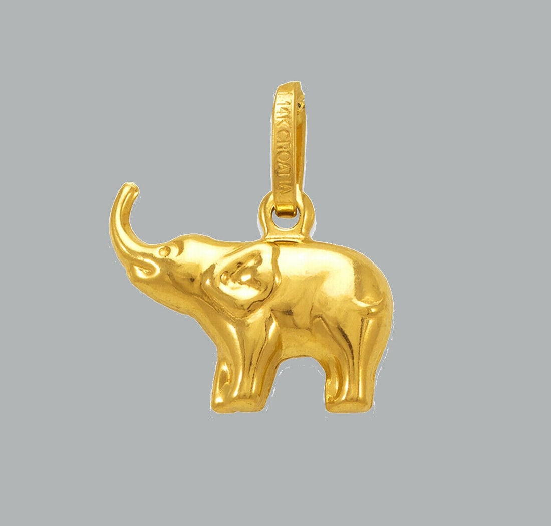 NEW 14K YELLOW GOLD ELEPHANT PENDANT POLISHED: NEW 14K YELLOW GOLD PENDANT New 14K Yellow Gold Charm/Pendant Measures: 16mm x 12mm Pendant has a polished finish Pendant is hollow Stamp: 14k Avg Weight: 1.1g