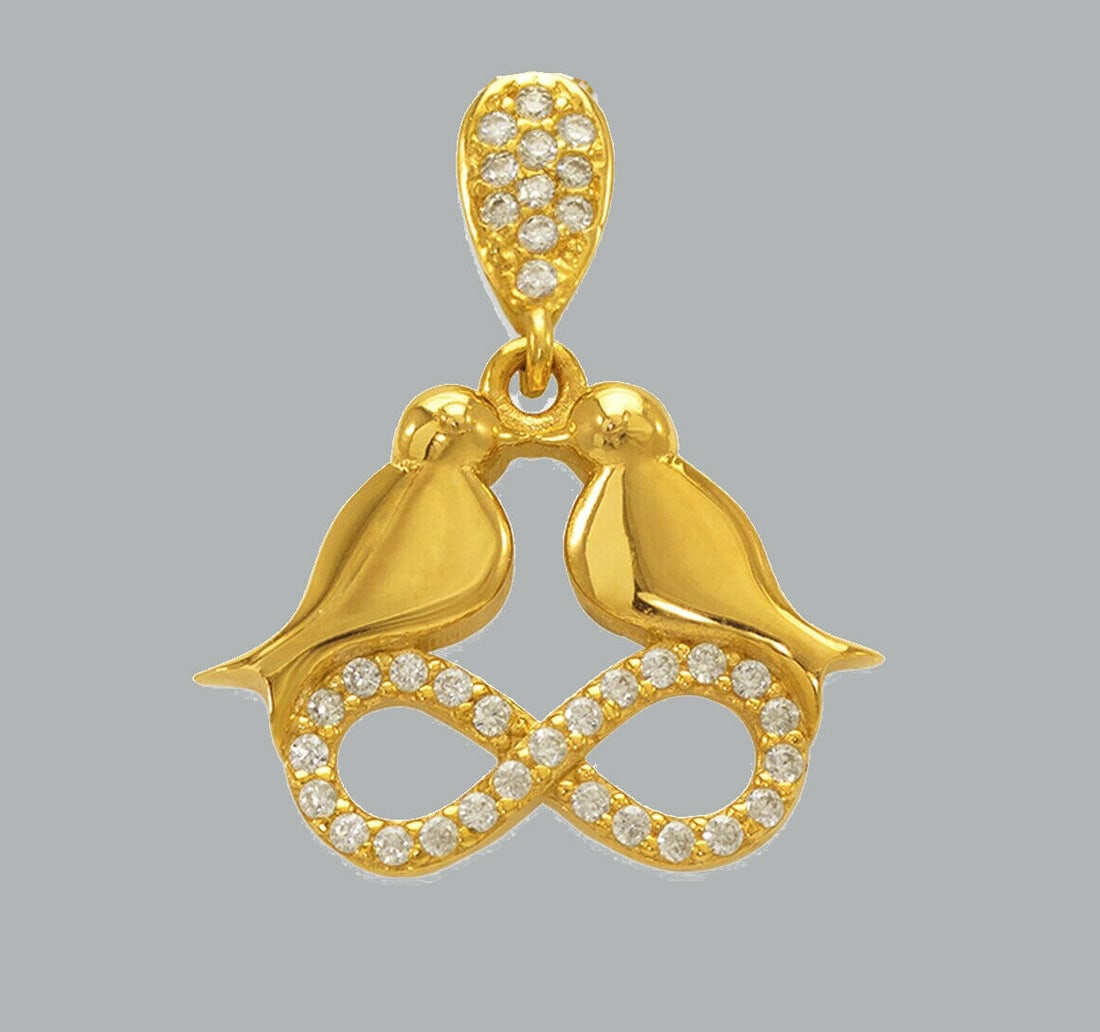 14K YELLOW GOLD CZ CHARM PENDANT INFINITY LOVE BIRDS: NEW 14K YELLOW GOLD CZ INFINITY PENDANT New 14K Yellow Gold pendant Pendant measures 18x14mm Set with cubic zirconia Polished finish Stamp: 14k Apx Weight: 1.8g