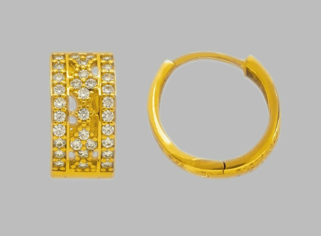 14K YELLOW GOLD LADIES ROUND CZ HUGGIE HOOP EARRINGS: NEW 14K YELLOW GOLD HUGGIE EARRINGS New 14K Yellow Gold Hoop Earrings Measures: 14mm in Diameter x 7mm Wide Earrings have a polished finish Set with Cubic Zirconia Snap closure Stamp: 14k Avg Weight: