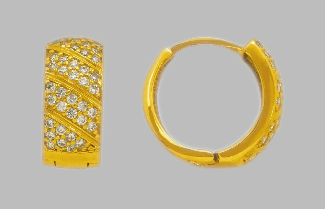 14K YELLOW GOLD ROUND CZ HUGGIE HOOP EARRINGS: NEW 14K YELLOW GOLD HUGGIE EARRINGS New 14K Yellow Gold Hoop Earrings Measures: 14mm in Diameter x 7mm Wide Earrings have a polished finish Set with Cubic Zirconia Snap closure Stamp: 14k Avg Weight: