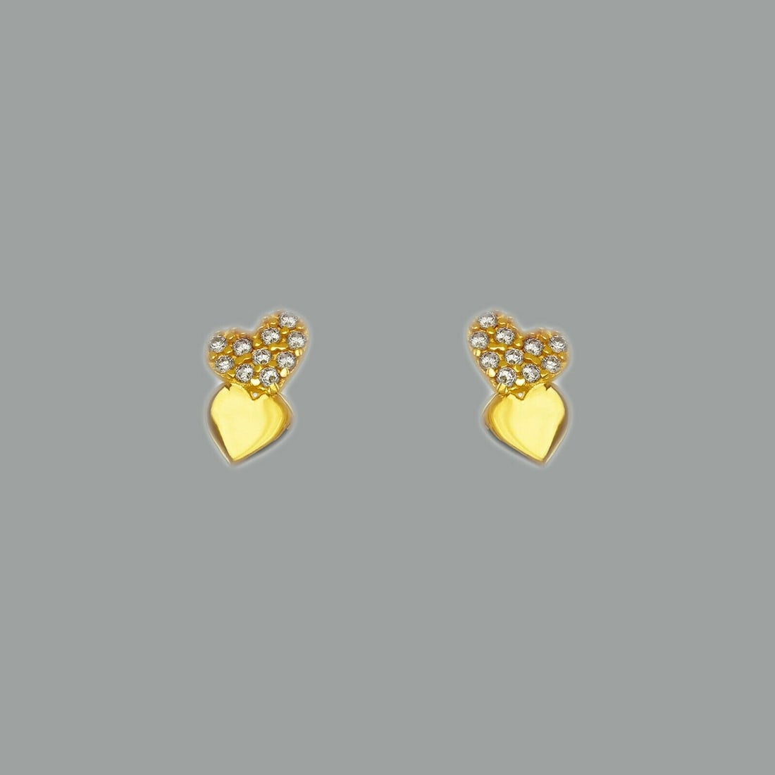 14K YELLOW GOLD HEART PAVE STUD CZ EARRINGS SCREW BACK: NEW 14K YELLOW GOLD STUD EARRINGS New 14K Yellow Gold Earrings Measures: 5mm x 9mm Stud Earrings with Cubic Zirconia Earrings have a polished finish Screw back Stamp: 14k Avg Weight: apx 1g