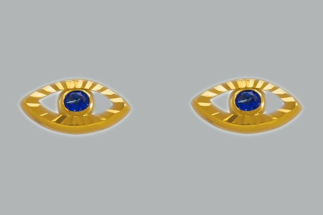 14K YELLOW GOLD STUD CZ EARRINGS SCREW BACK EVIL EYE: NEW 14K YELLOW GOLD STUD EARRINGS New 14K Yellow Gold Earrings Measures: 7.5x4mm Earrings with Cubic Zirconia Earrings have a polished finish Screw back Stamp: 14K