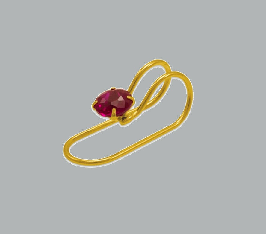 NEW 14K YELLOW GOLD COLORED CZ CUFF EARRING RED: NEW 14K YELLOW GOLD CUFF EARRING New 14K Yellow Gold Earring Measures: 11 x 4mm Colored CZ Earring One piece for one ear Earring has a polished finish Stamp: 14K