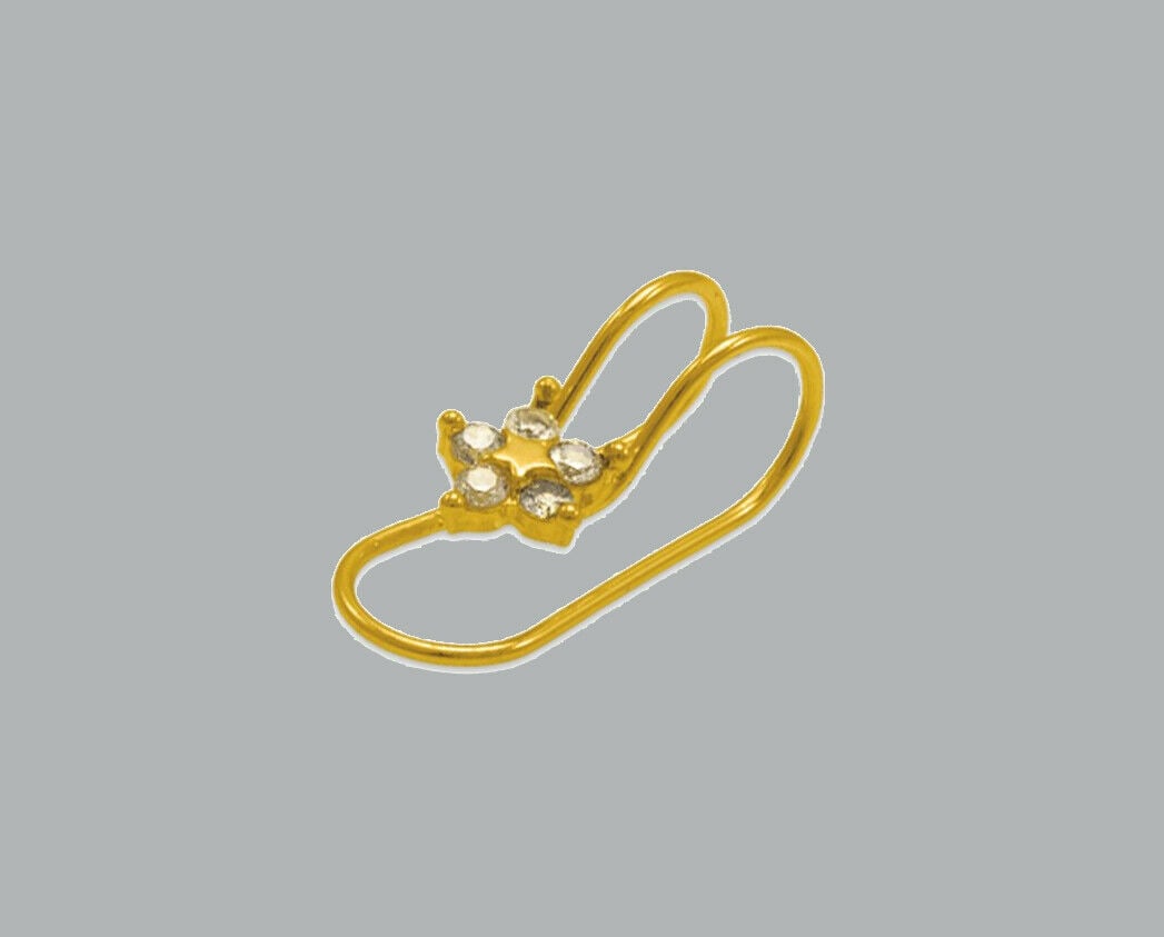 NEW 14K YELLOW GOLD CZ CUFF EARRING STAR FLOWER: NEW 14K YELLOW GOLD CUFF EARRING New 14K Yellow Gold Earring Measures: 11 x 5.5mm CZ Earring One piece for one ear Earring has a polished finish Stamp: 14K