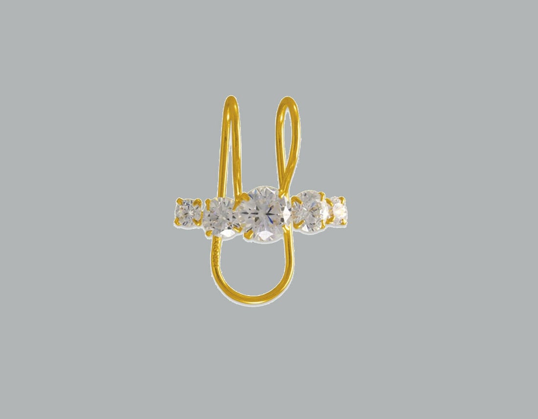 NEW 14K YELLOW GOLD CZ CUFF EARRING CLEAR 5 STONE: NEW 14K YELLOW GOLD CUFF EARRING New 14K Yellow Gold Earring Measures: 11 x 11mm Clear CZ Earring One piece for one ear Earring has a polished finish Stamp: 14K