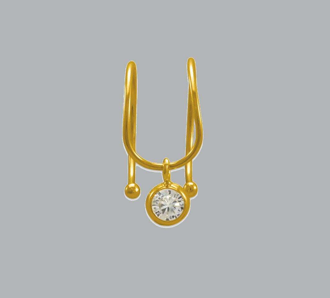 NEW 14K YELLOW GOLD CLEAR CZ CUFF EARRING DANGLE: NEW 14K YELLOW GOLD CUFF EARRING New 14K Yellow Gold Earring Measures: 11 x 5.5mm CZ Earring One piece for one ear Earring has a polished finish Stamp: 14K