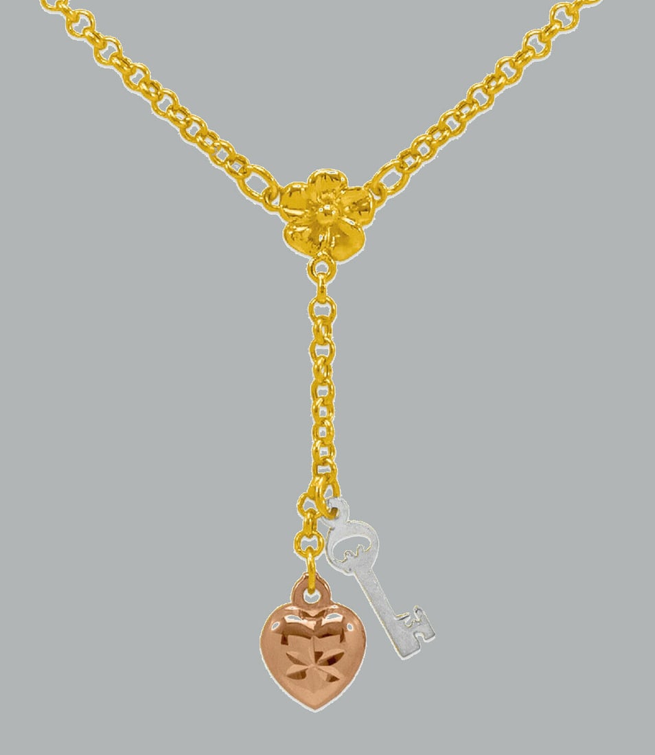 NEW 14K TRI COLOR GOLD LADIES FANCY HEART KEY NECKLACE: NEW 14K TRI COLOR GOLD FANCY HEART & KEY NECKLACE New 14K Tri color Gold chain necklace Measures: 18" Long Heart measures 10mm Polished finish Lobster clasp Stamp: 14k Apx Weight: 3.3g