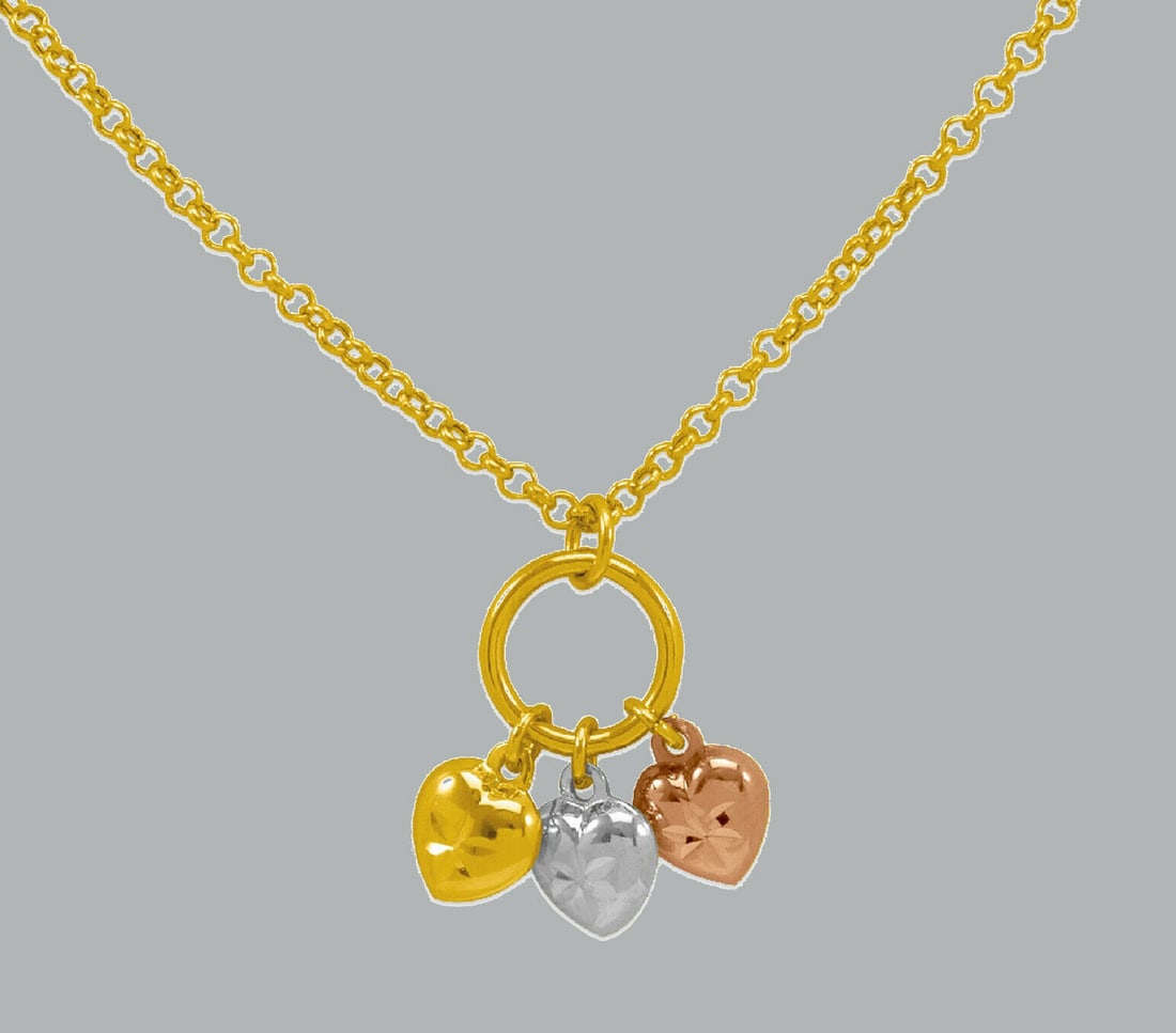 NEW 14K TRI COLOR GOLD LADIES FANCY HEART NECKLACE 18": NEW 14K TRI COLOR GOLD FANCY HEART NECKLACE New 14K Tri color Gold chain necklace Measures: 18" Long Pendant measures 21mm Polished finish Lobster clasp Stamp: 14k Apx Weight: 3.6g