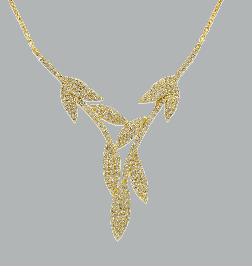 NEW 14K YELLOW GOLD LADIES FANCY CZ NECKLACE 18": NEW 14K YELOW GOLD CZ LEAF NECKLACE New 14K Yellow Gold chain necklace Measures: 18" Long Pendant measures 50mm x 44mm Polished finish Stamp: 14k Avg Weight: 18\" - 6g