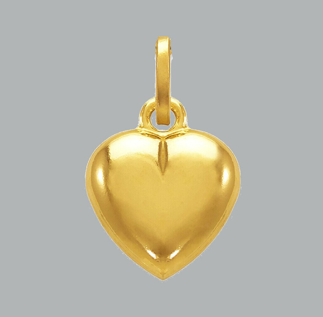 NEW 14K YELLOW GOLD PUFFED HEART CHARM PENDANT 12mm: NEW 14K YELLOW GOLD HEART PENDANT New 14K Yellow Gold Puffed Heart Pendant Measures: 12mm - 1.2g Pendant has a polished finish Pendant is hollow Stamp: 14k