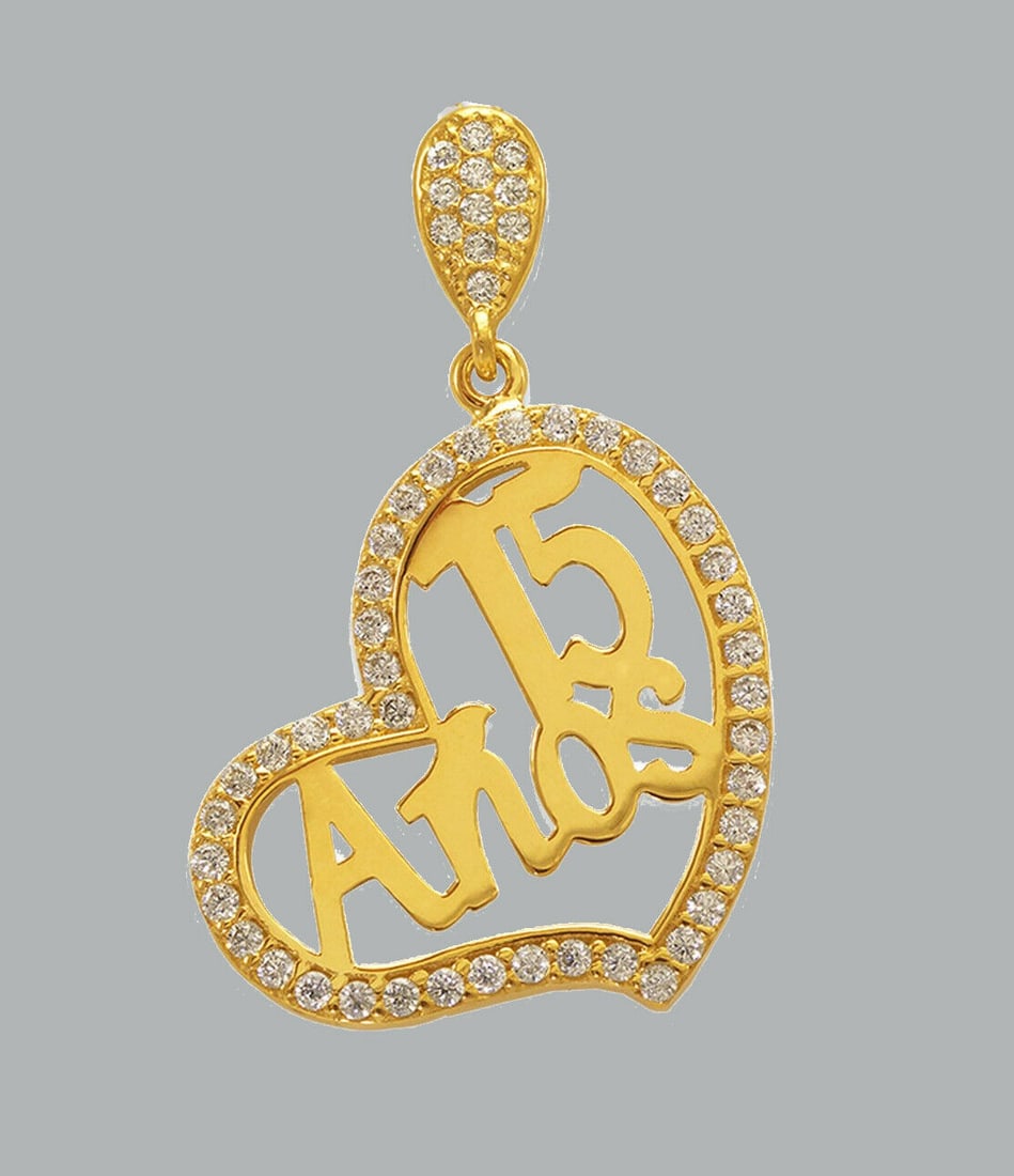 14K YELLOW GOLD CZ FANCY CHARM PENDANT 15 ANOS HEART: NEW 14K YELLOW GOLD 15 ANOS CZ PENDANT New 14K Yellow Gold pendant Pendant measures 20mm x 29mm Set with cubic zircon Polished finish Stamp: 14k Apx Weight: 2g