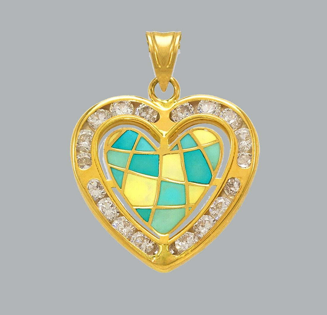 NEW 14K YELLOW GOLD CZ FANCY CHARM PENDANT HEART ENAMEL: NEW 14K YELLOW GOLD ENAMEL CZ HEART PENDANT New 14K Yellow Gold pendant Heart measures 17x16mm Set with cubic zirconia Enamel Polished finish Stamp: 14k Apx Weight: 1.1g