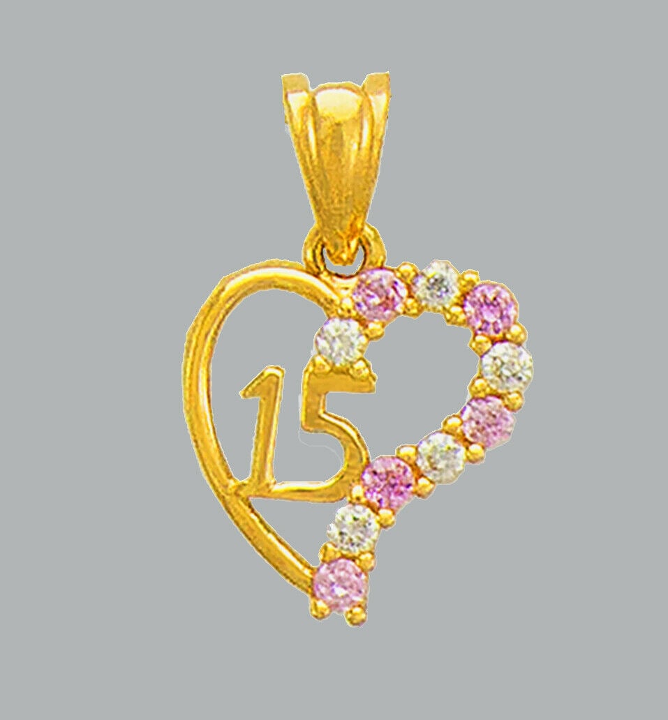 14K YELLOW GOLD PINK CZ CHARM PENDANT HEART 15 ANOS: NEW 14K YELLOW GOLD CZ HEART PENDANT New 14K Yellow Gold pendant Heart measures 11x12mm Set with cubic zirconia Polished finish Stamp: 14k Apx Weight: 1.2g