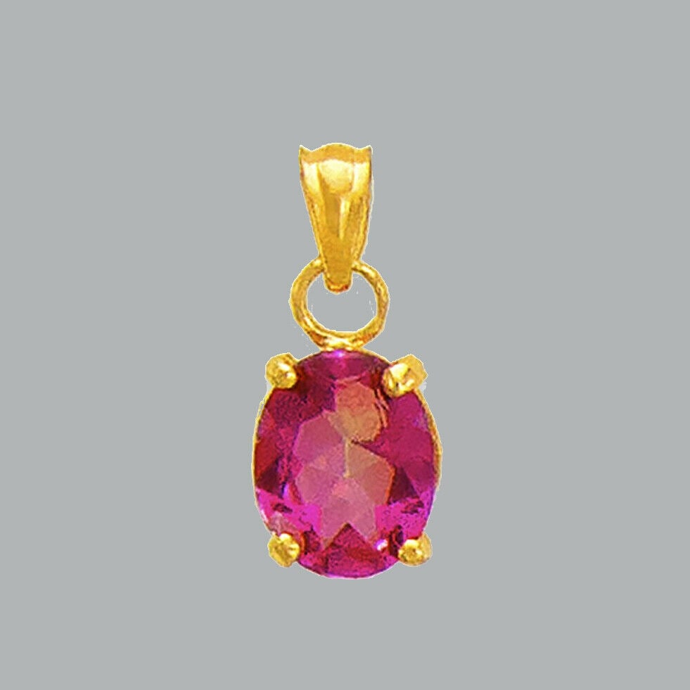 NEW 14K YELLOW GOLD OVAL CZ FANCY CHARM PENDANT PINK: NEW 14K YELLOW GOLD CZ PENDANT New 14K Yellow Gold pendant Pendant measures 7x10mm Set with cubic zirconia Polished finish Stamp: 14k Apx Weight: 0.9g