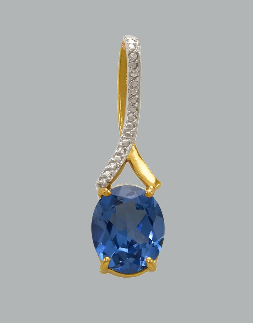 14K YELLOW GOLD OVAL CUT CZ FANCY CHARM PENDANT BLUE: NEW 14K YELLOW GOLD CZ PENDANT New 14K Yellow Gold pendant Pendant measures 10x33mm Set with cubic zirconia Polished finish Stamp: 14k Apx Weight: 3.2g