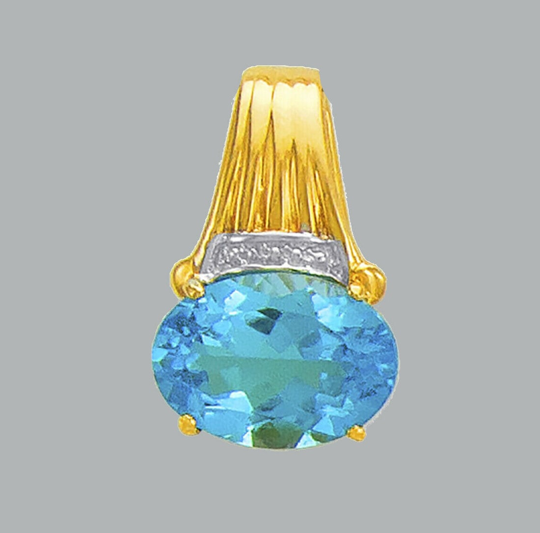 14K YELLOW GOLD OVAL CUT CZ FANCY CHARM PENDANT BLUE: NEW 14K YELLOW GOLD CZ PENDANT New 14K Yellow Gold pendant Pendant measures 14x21mm Set with cubic zirconia Polished finish Stamp: 14k Apx Weight: 4.1g