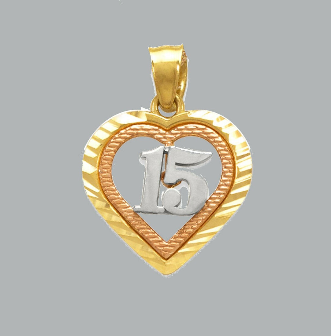 NEW 14K TRI COLOR GOLD PENDANT / CHARM HEART 15 ANOS: NEW 14K TRI COLOR GOLD 15 ANOS HEART PENDANT New 14K Tri color Gold Pendant Measures: 14x14mm Pendant has a polished finish Stamp: 14k Apx Weight: 0.8g