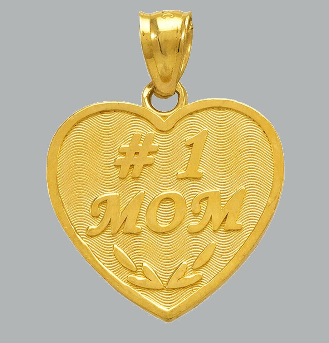 NEW 14K YELLOW GOLD HEART CHARM PENDANT, #1 MOM: NEW 14K YELLOW GOLD #1 MOM HEART PENDANT New 14K Yellow Gold Heart Pendant Measures: 18mm x 17mm - 2g Pendant has a polished finish Stamp: 14k