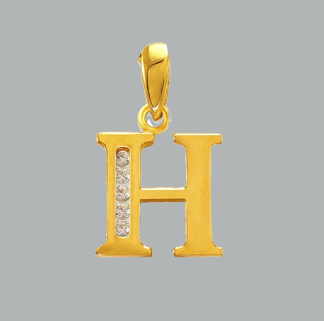 NEW 14K YELLOW GOLD CZ FANCY CHARM PENDANT INITIAL H: NEW 14K YELLOW GOLD CZ INITIAL PENDANT New 14K Yellow Gold pendant Pendant measures 9x10mm Set with cubic zirconia Polished finish Stamp: 14k Apx Weight: 0.7g